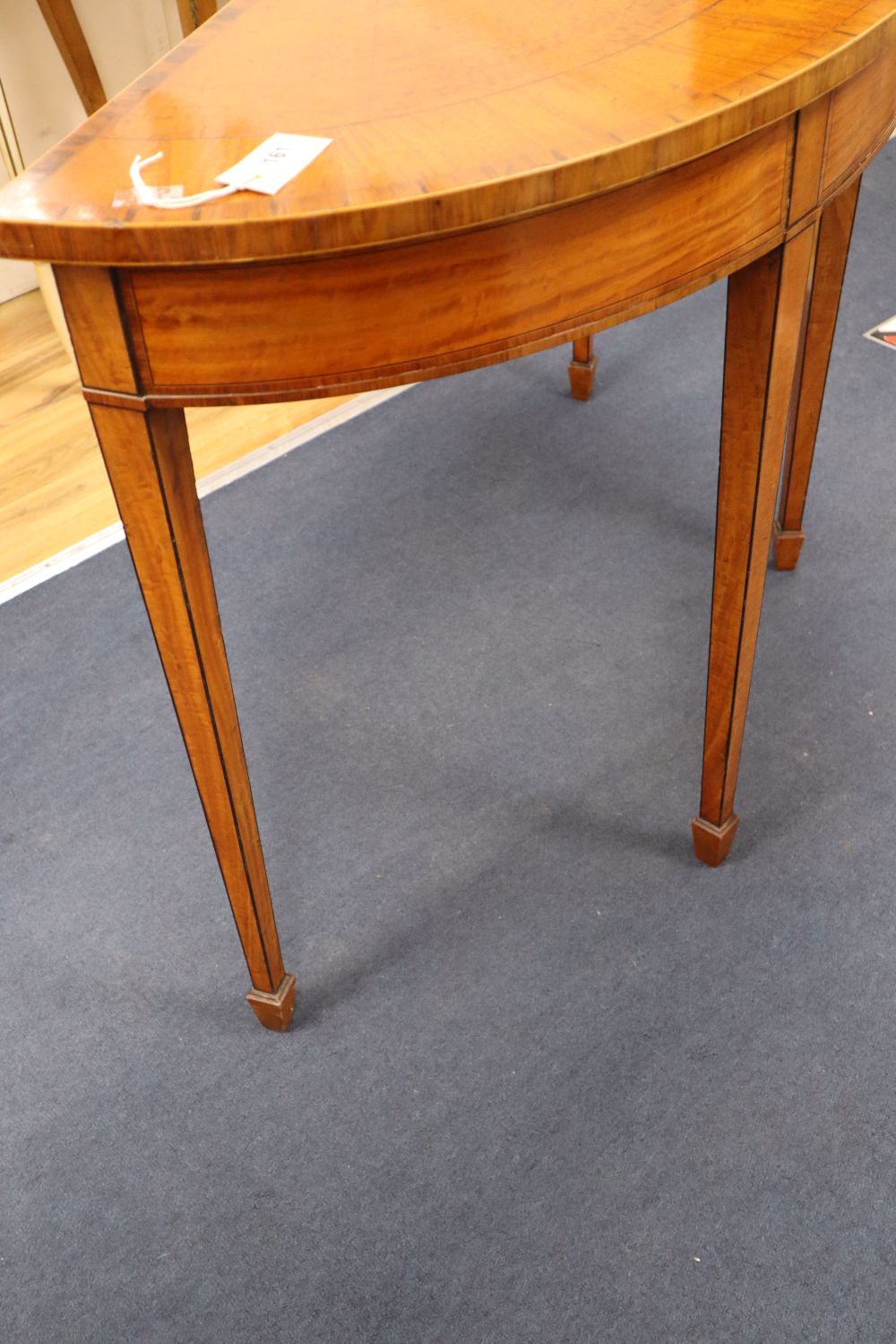 An Edwardian satinwood demi-lune console table, width 113cm height 77cm